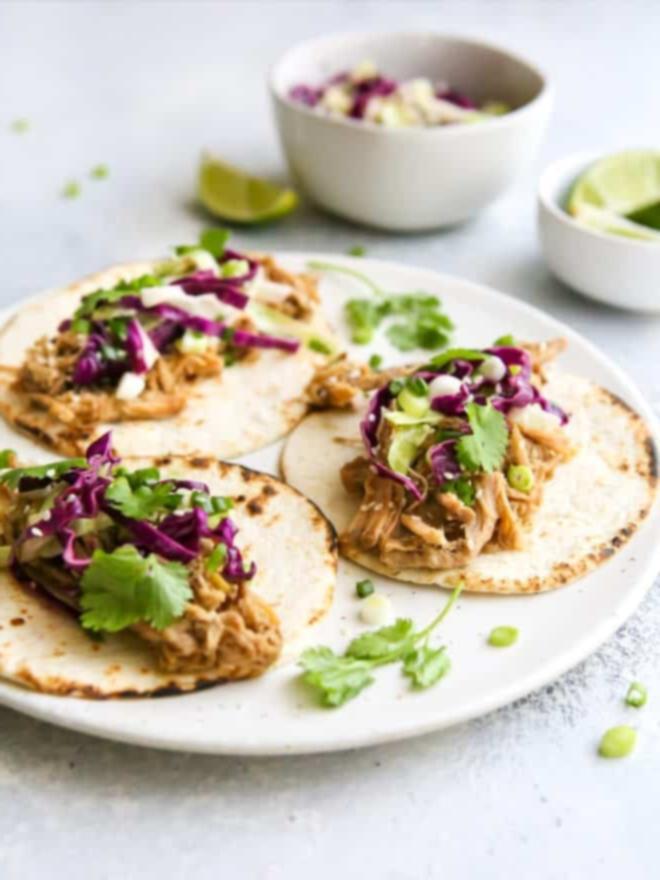 Οι 10 καλύτερες συνταγές του 2022 4 close up view of slow cooker korean pork tacos on a plate