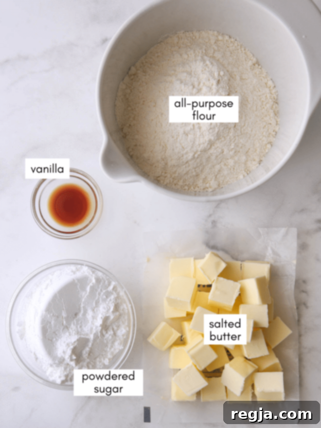 Εικόνα με τα συστατικά για shortbread με καστανό βούτυρο: αλατισμένο βούτυρο, ζάχαρη άχνη, αλεύρι, εκχύλισμα βανίλιας
