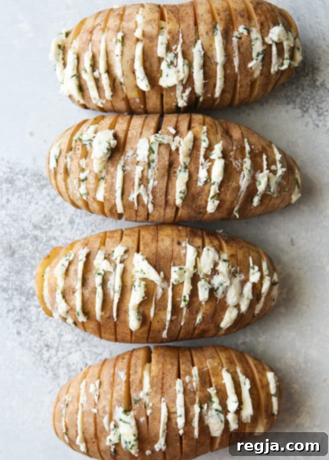Πατάτες Hasselback με βούτυρο σχοινόπρασου