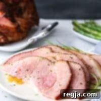 Μελένιο και Βουτυράτο Χοιρομέρι 6 Μέλι και βούτυρο γλασαρισμένο ζαμπόν σπιράλ με μέλι, βούτυρο, σκόρδο και δεντρολίβανο. Γλυκό και γεμάτο γεύση, με ελάχιστη προετοιμασία!