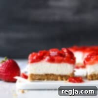Αυτές οι μπάρες τσιζκέικ φράουλας χωρίς ψήσιμο είναι ένα διασκεδαστικό, εύκολο και νόστιμο καλοκαιρινό επιδόρπιο!