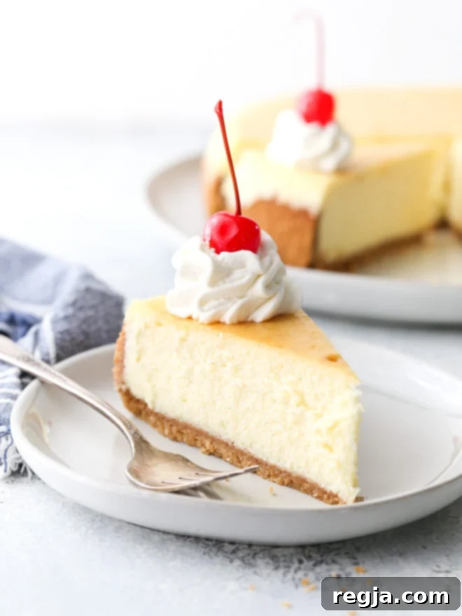 Classic cheesecake with graham cracker crust is silky smooth, ultra rich, and very creamy.