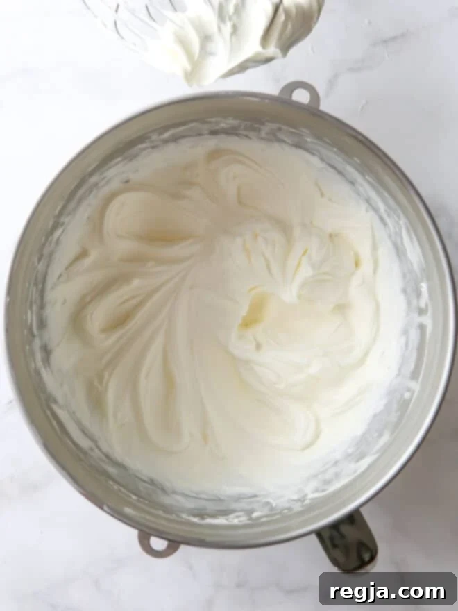 beautiful whipped chantilly cream frosting in a bowl