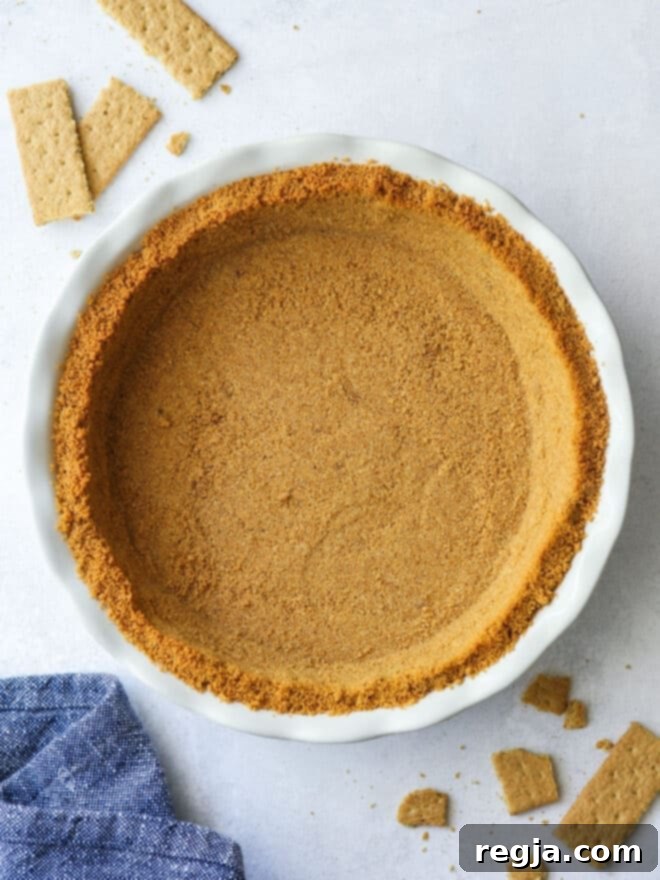 Ψημένη βάση τάρτας graham cracker, χρυσαφένια και τραγανή