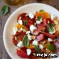 Ντοματοσαλάτα με κατσικίσιο τυρί και κουκουνάρια 2 Σαλάτα Ντομάτας με Κατσικίσιο Τυρί και Κουκουνάρι | completelydelicious.com