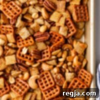 Κοντινό πλάνο ψημένου σνακ με σφένδαμο και ξηρούς καρπούς