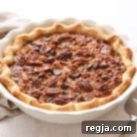 Σοκολατένια Τάρτα με Καρύδα και Πεκάν 9 πλαϊνή όψη σοκολατένιας καρυδόπιτας με καρύδα