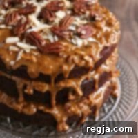Σοκολατένια Τούρτα Κόλα με Dulce de Leche, Γλάσο Καρύδας και Πεκάν | completelydelicious.com
